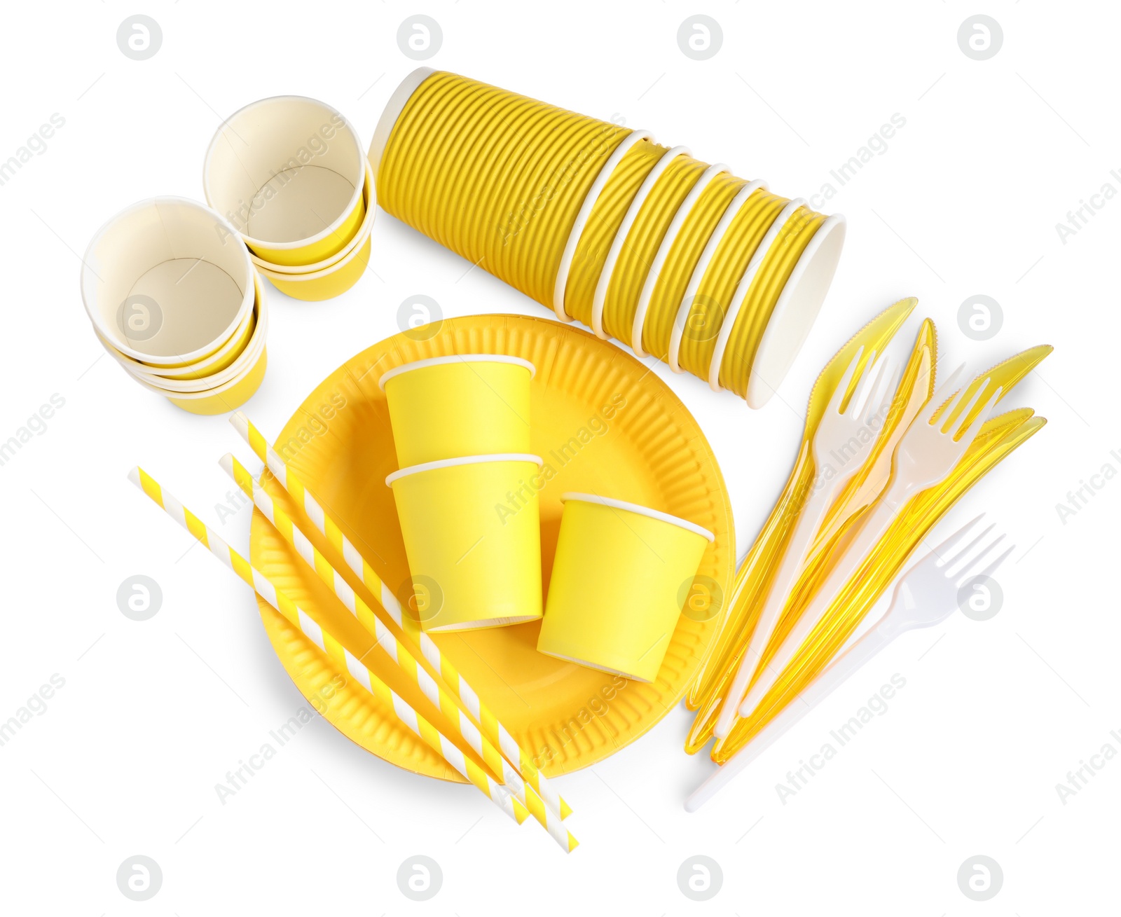 Photo of Set of bright disposable tableware on white background, top view