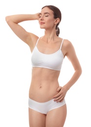Beautiful woman in underwear on white background