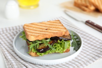 Photo of Delicious fresh sandwich with eggplant served on white table