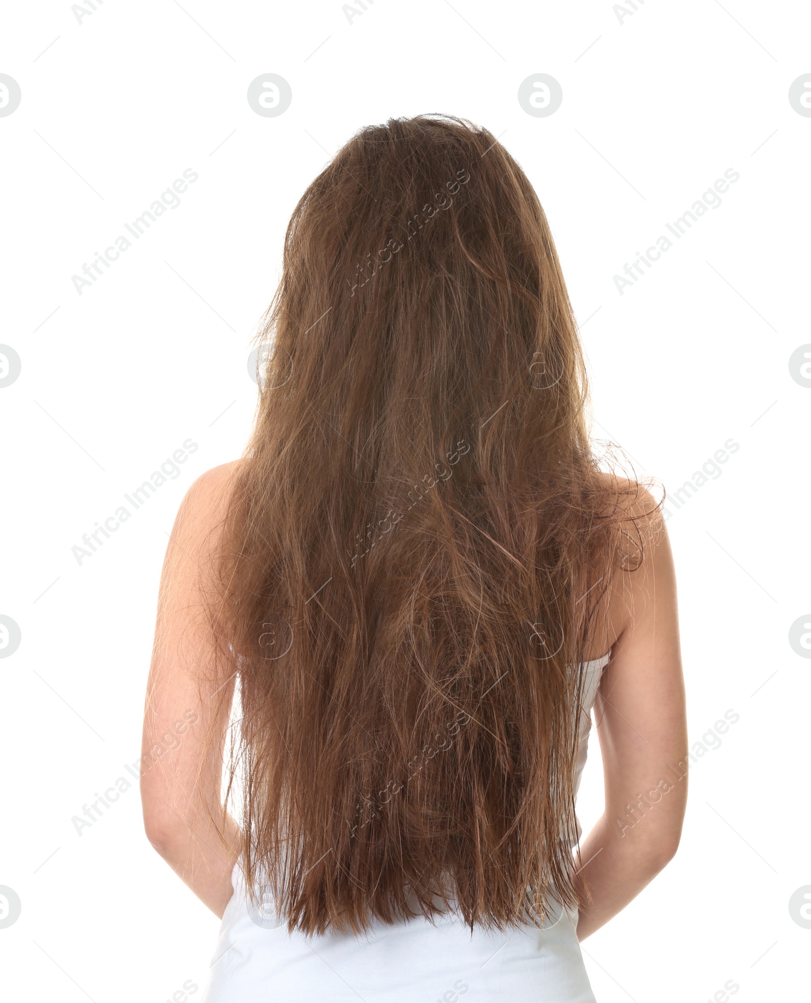 Photo of Woman with tangled brown hair on white background