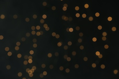 Blurred lights on dark background. Beautiful bokeh effect