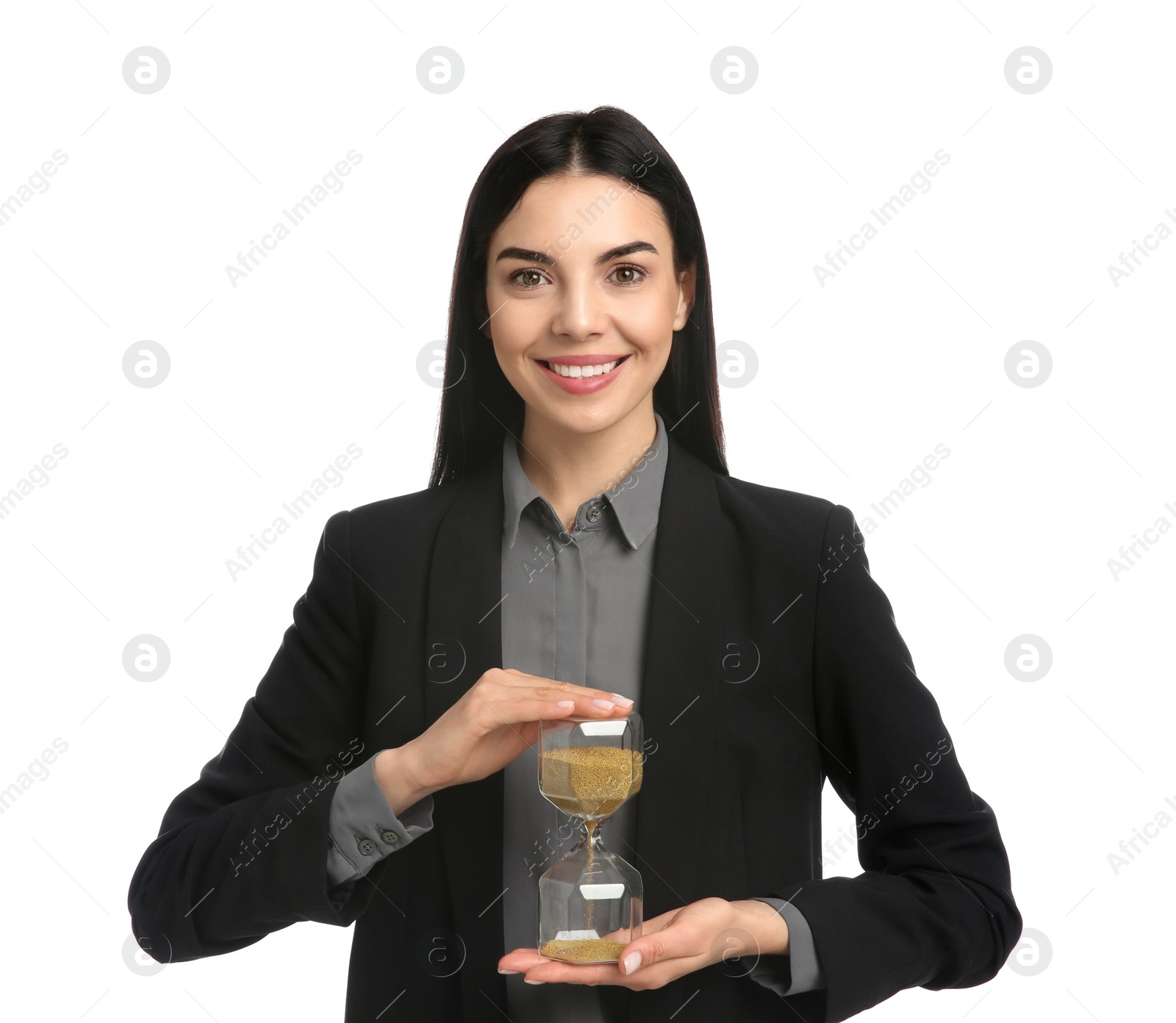 Photo of Businesswoman holding hourglass on white background. Time management