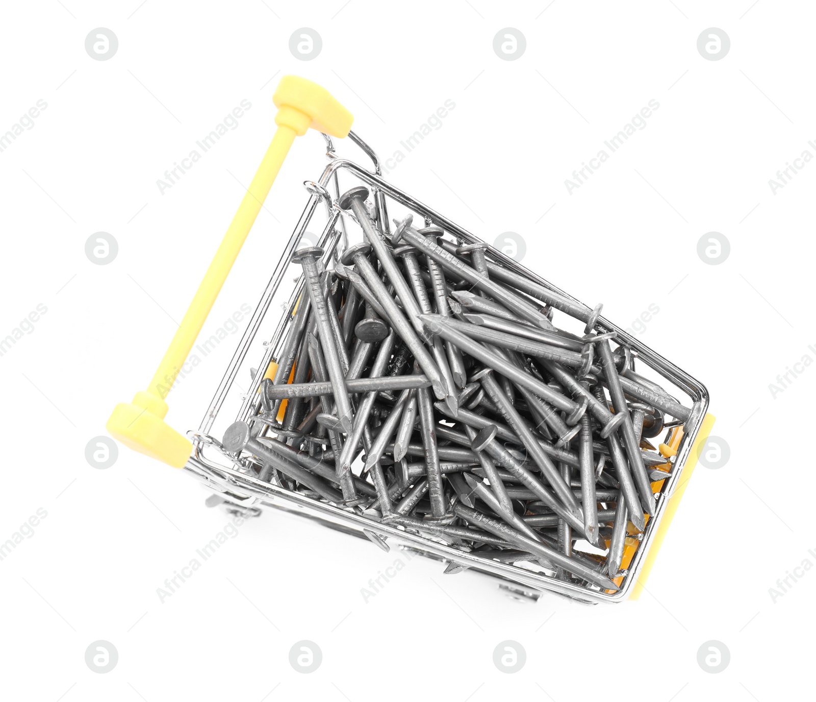 Photo of Metal nails in shopping cart isolated on white, top view