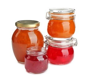 Photo of Jars with different sweet jam on white background