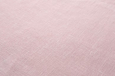 Photo of Texture of pink fabric as background, closeup