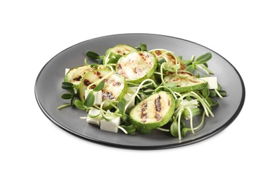 Photo of Delicious salad with grilled zucchini slices and feta cheese on white background