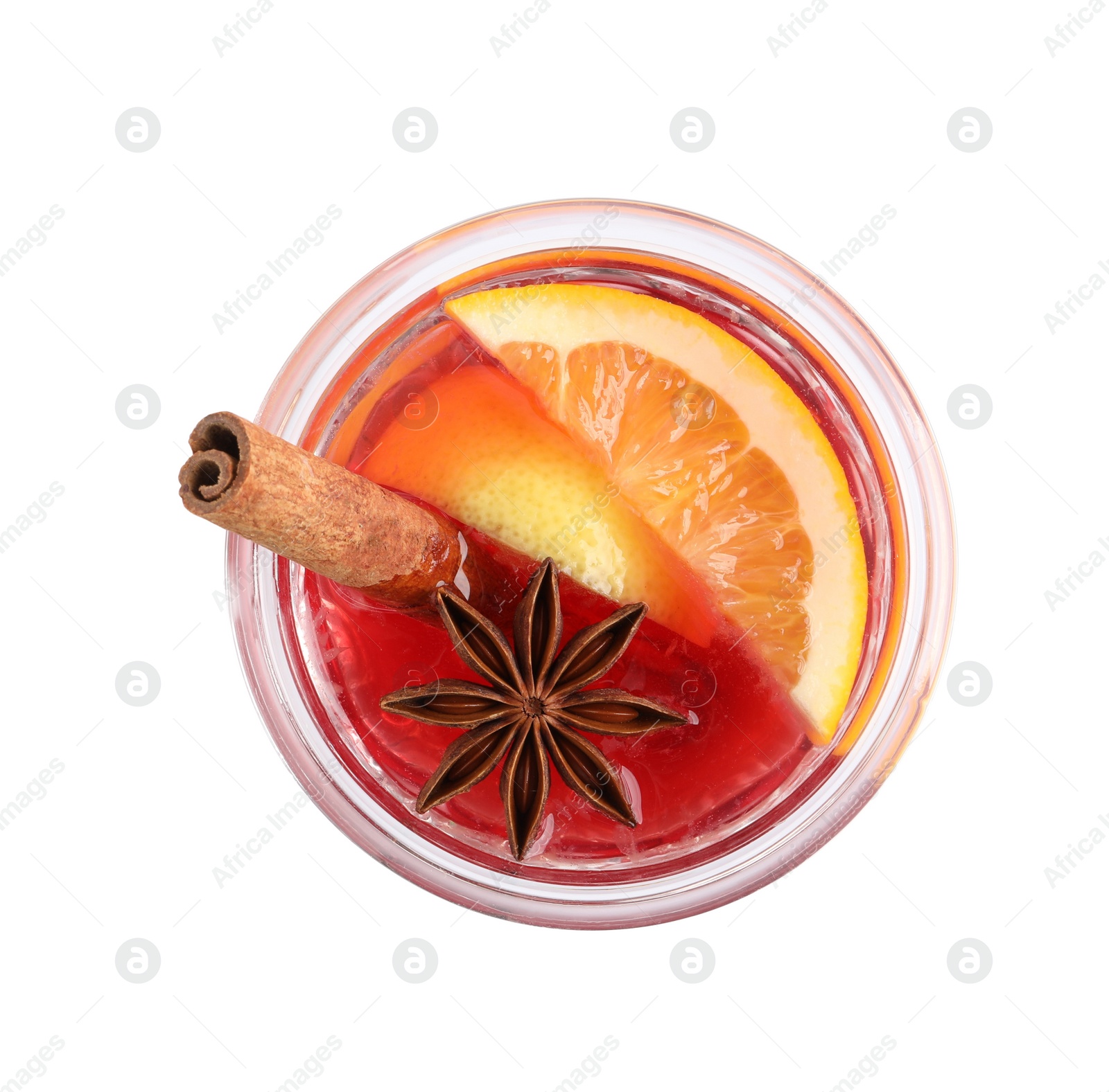 Photo of Glass of aromatic punch drink isolated on white, top view