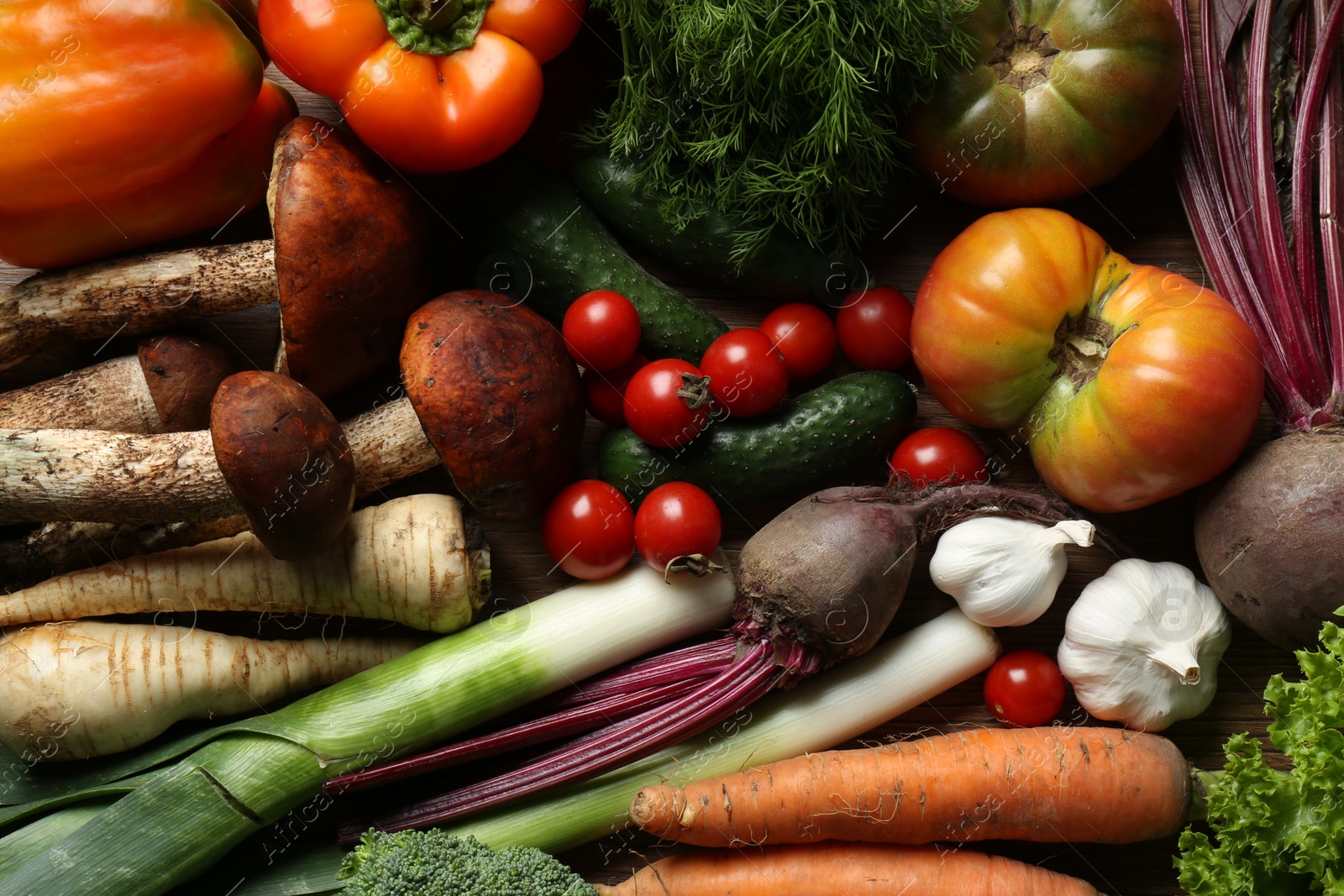 Photo of Different fresh ripe vegetables as background, closeup