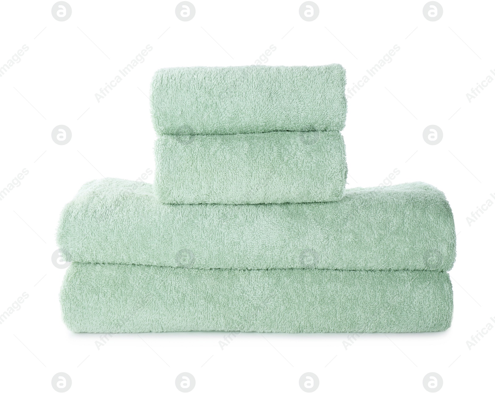 Photo of Stack of fresh light towels isolated on white