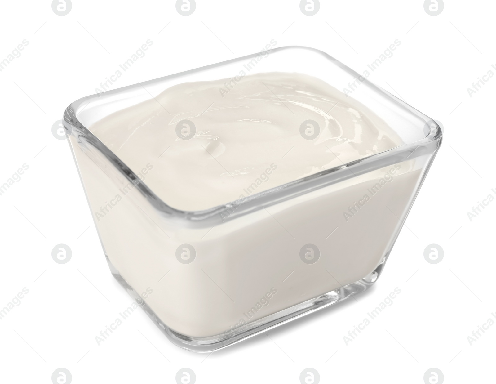 Photo of Glass bowl with yummy yogurt on white background