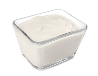 Glass bowl with yummy yogurt on white background