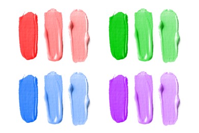 Image of Paint strokes of different colors on white background, top view