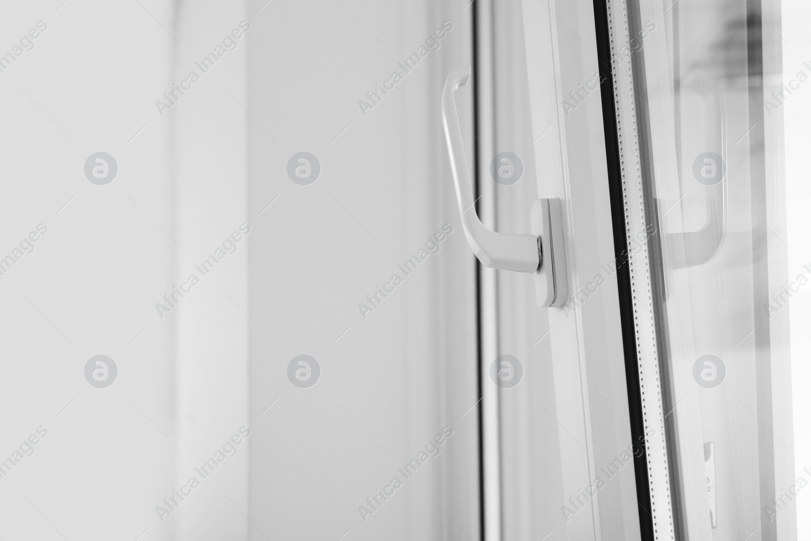 Photo of Modern window indoors, closeup view. Home interior