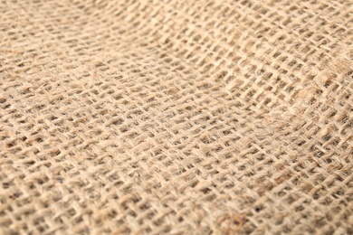 Photo of Sustainable hemp fabric as background, closeup