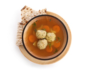 Photo of Bowl of Jewish matzoh balls soup isolated on white, top view