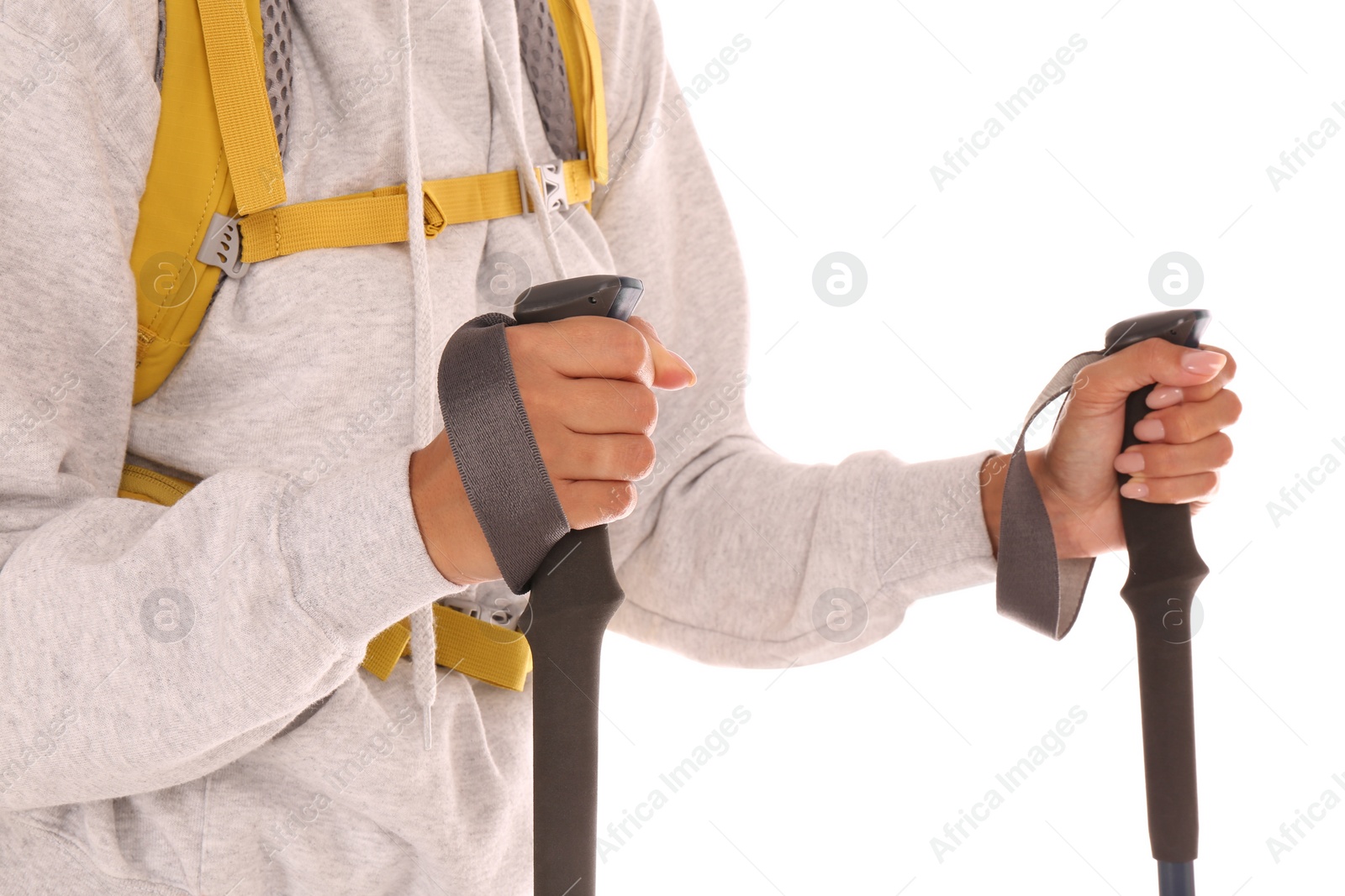 Photo of Woman with trekking poles on white background, closeup