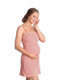 Happy pregnant woman touching her belly on white background