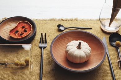 Photo of Autumn table setting with pumpkin on white background
