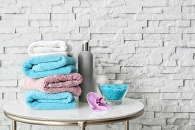 Photo of Stack of clean towels on table