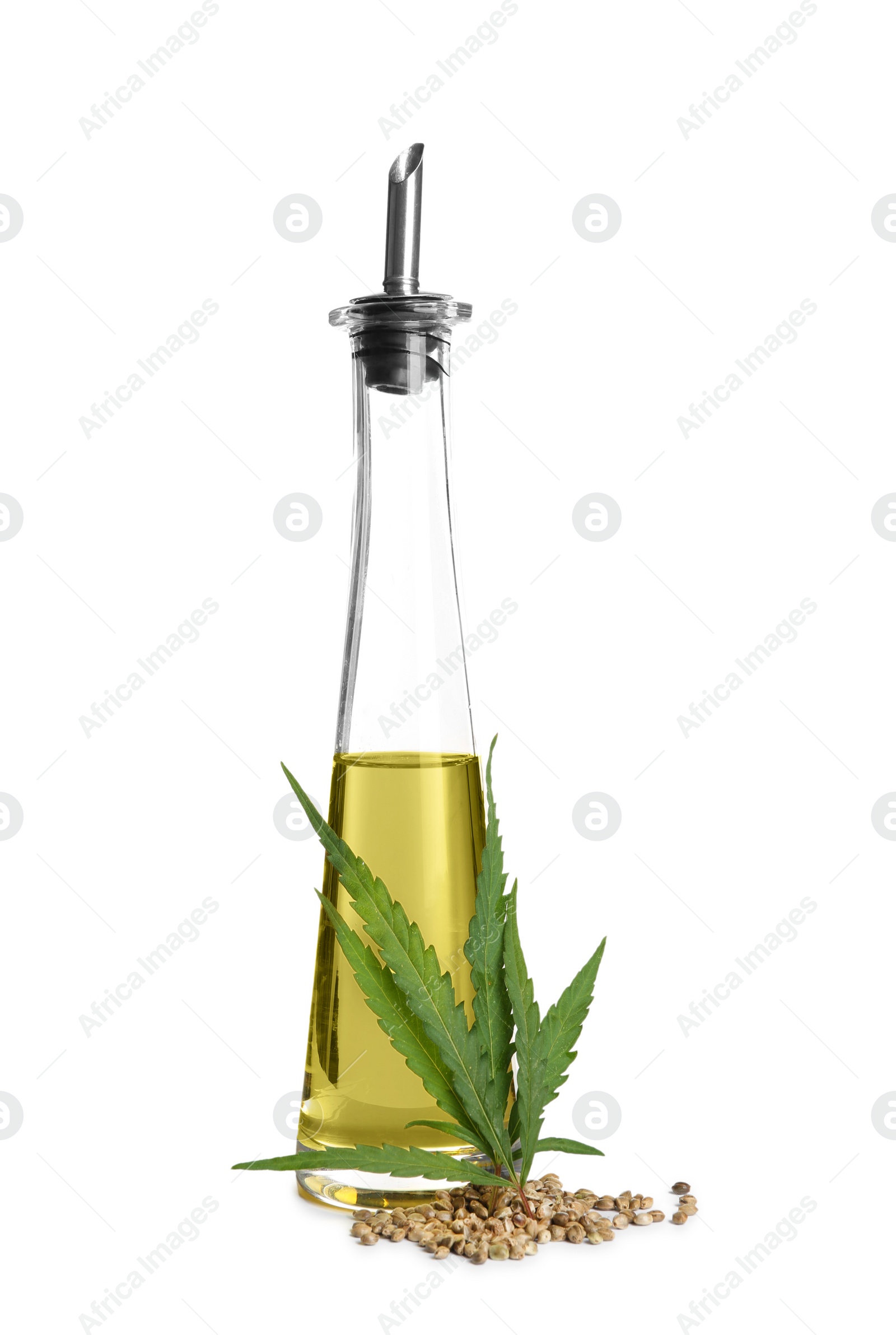 Photo of Bottle with hemp oil, leaf and seeds on white background