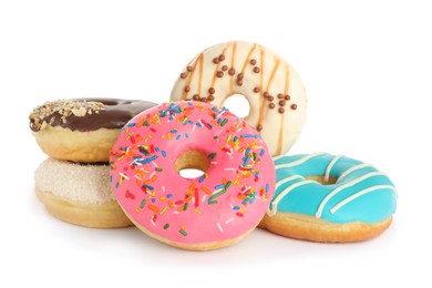 Photo of Sweet tasty glazed donuts on white background