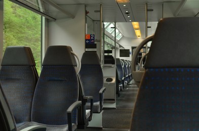 Comfortable seats in empty modern passenger train