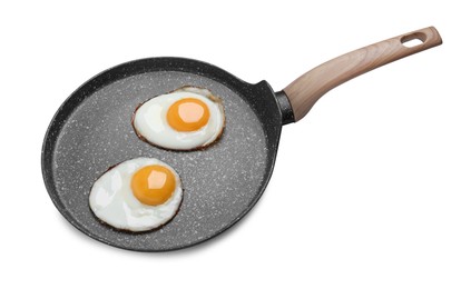 Photo of Frying pan with delicious fried eggs isolated on white