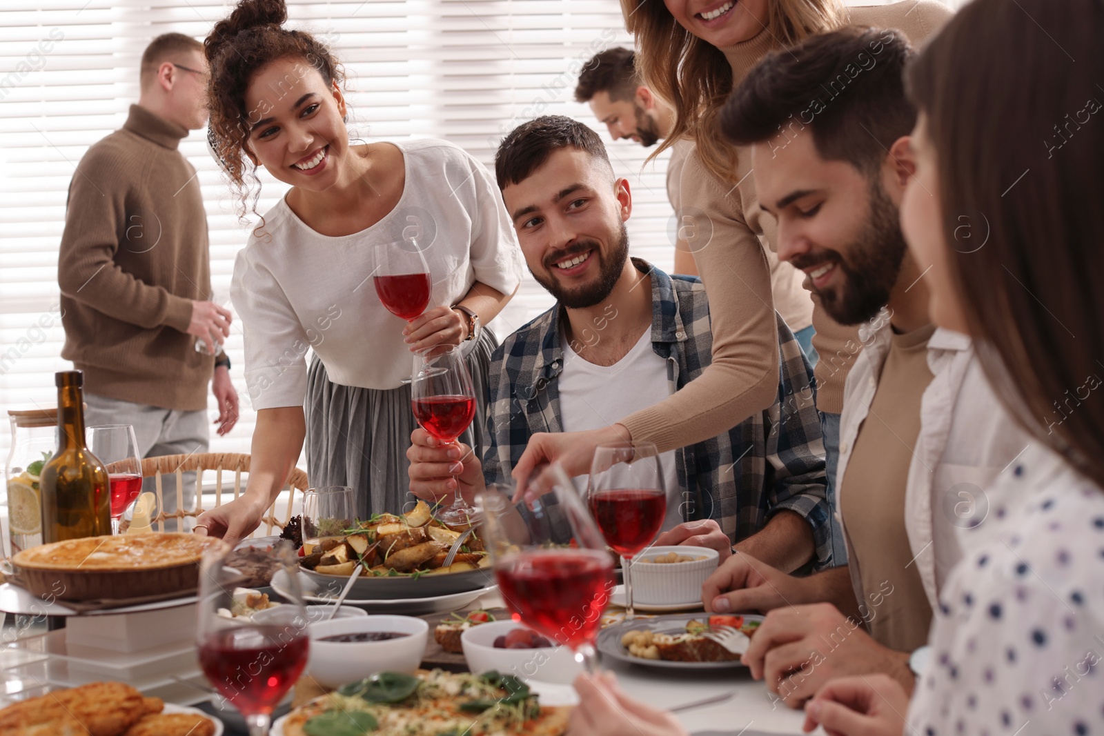 Photo of Group of people having brunch together indoors