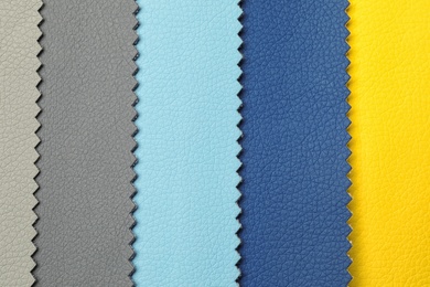 Photo of Leather samples of different colors for interior design as background