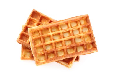 Photo of Delicious Belgian waffles on white background, top view