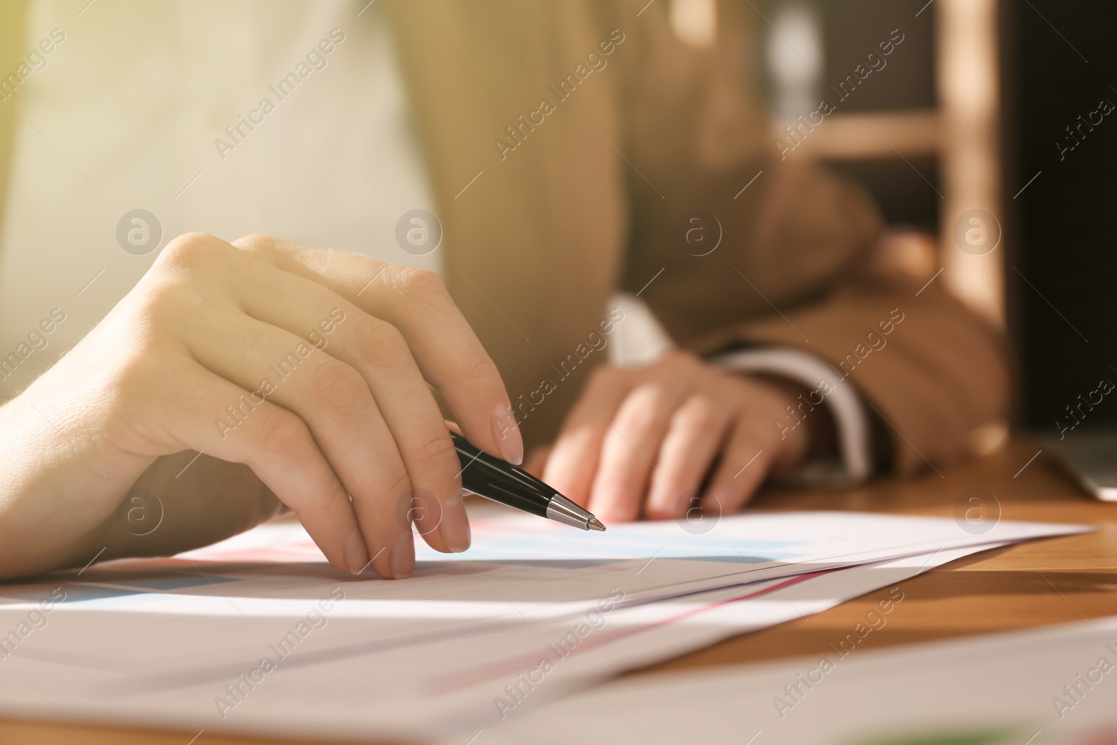 Image of Woman working at table in office, closeup. Insurance concept