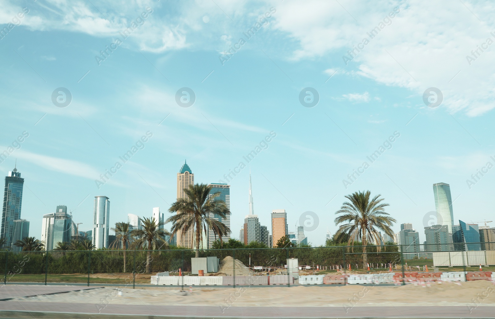 Photo of DUBAI, UNITED ARAB EMIRATES - NOVEMBER 03, 2018: Landscape with different hotels on sunny day