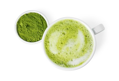 Cup of fresh matcha latte and green powder isolated on white, top view