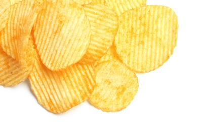 Tasty ridged potato chips on white background