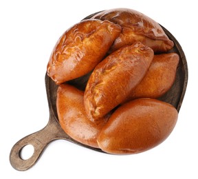 Photo of Wooden board with delicious baked patties on white background, top view