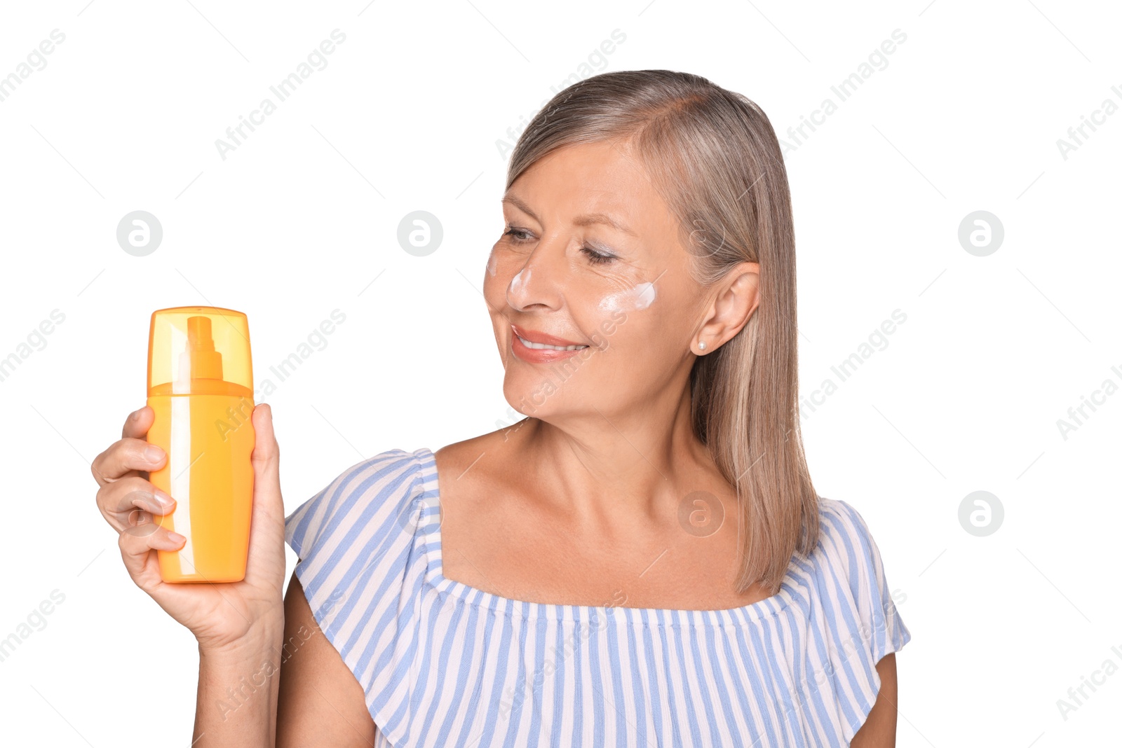 Photo of Beautiful senior woman with sun protection cream isolated on white