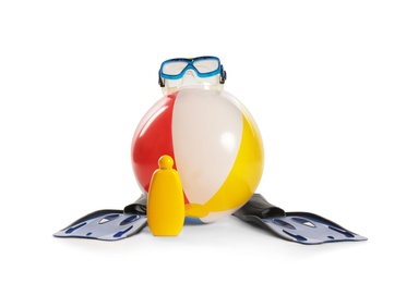 Photo of Beach ball, sunblock lotion and swimming equipment on white background