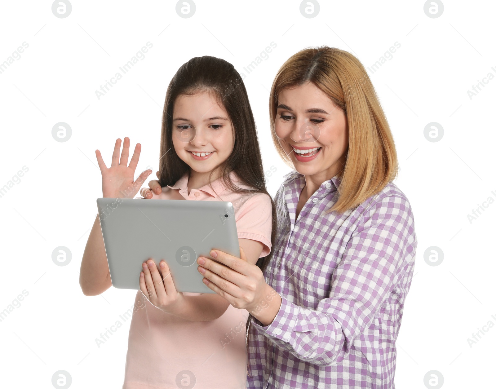 Photo of Mother and her daughter using video chat on tablet against white background