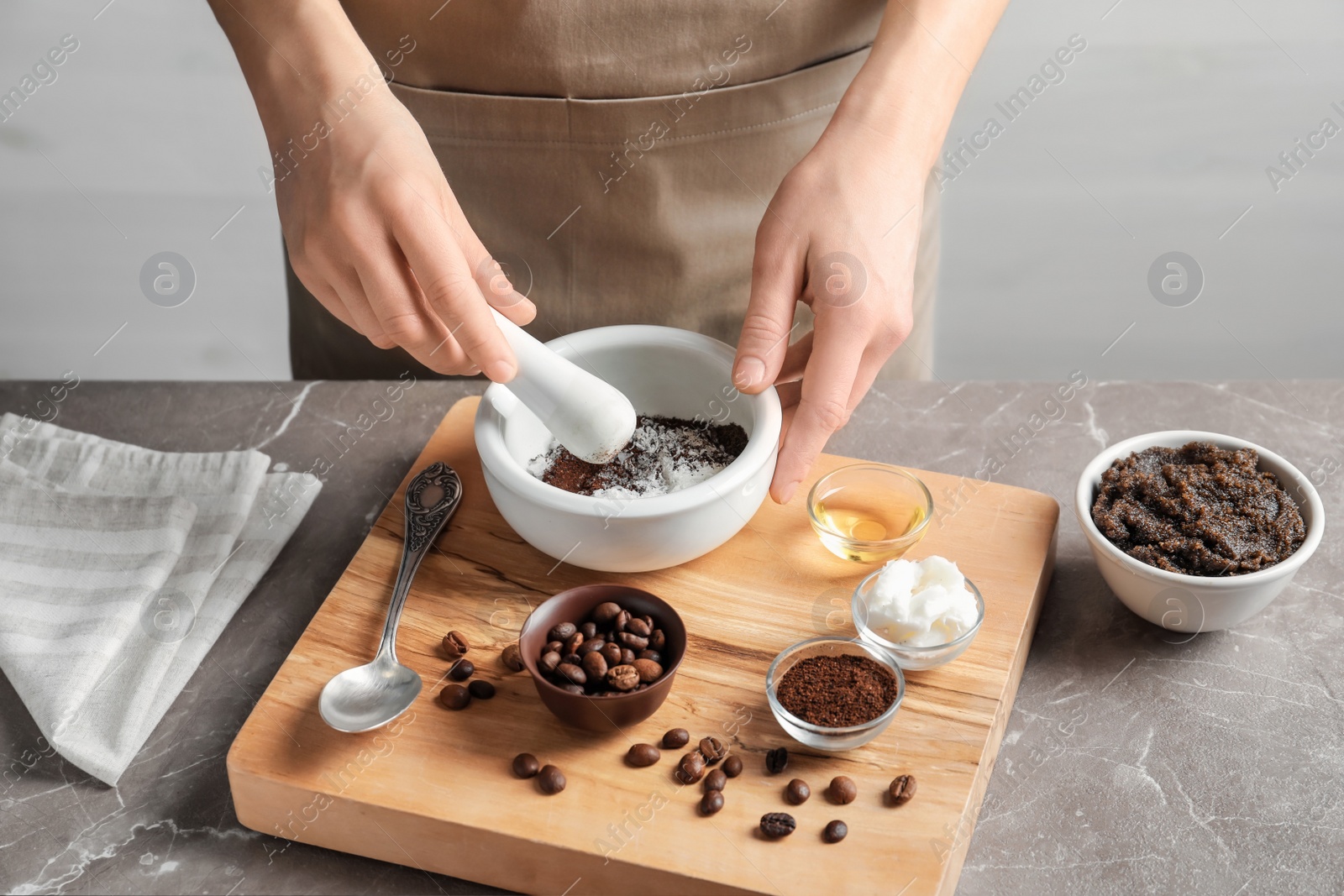 Photo of Woman preparing natural body scrub