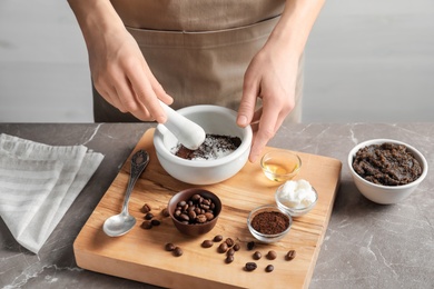 Woman preparing natural body scrub