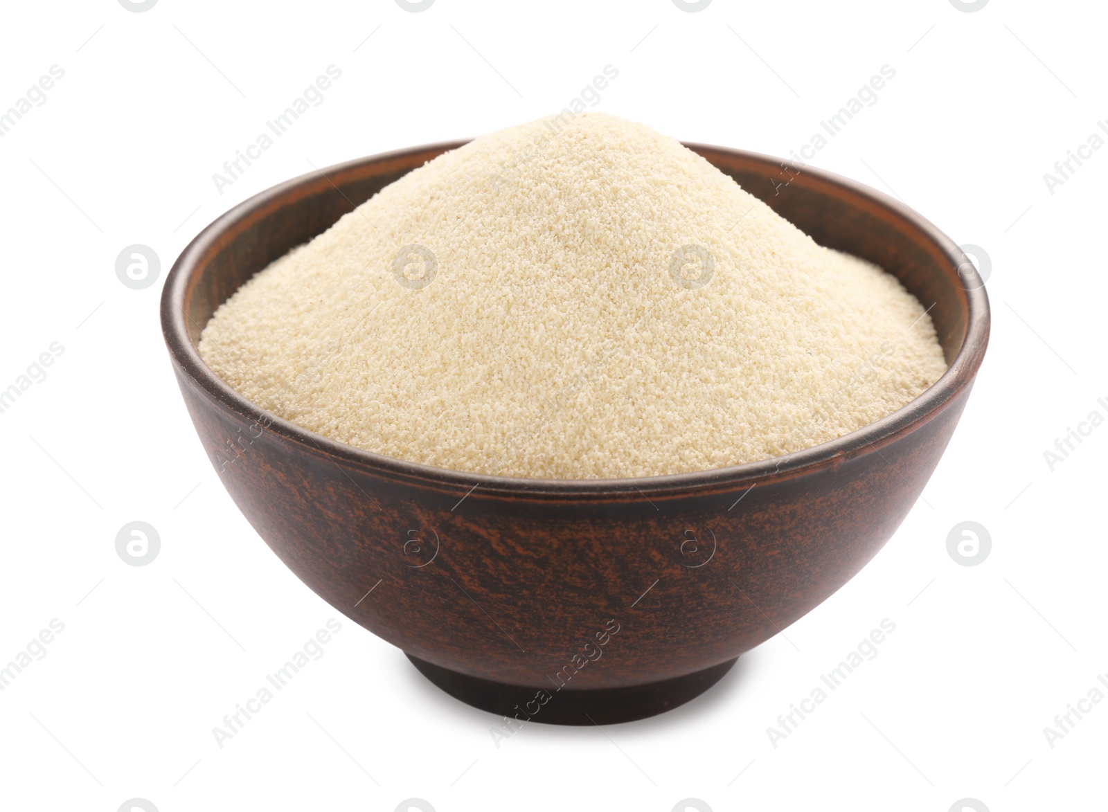 Photo of Bowl of uncooked organic semolina isolated on white