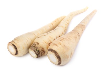 Photo of Tasty fresh ripe parsnips on white background