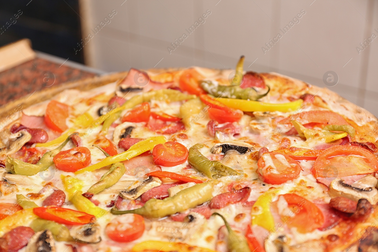 Photo of Delicious pizza on table, closeup. Fresh from oven