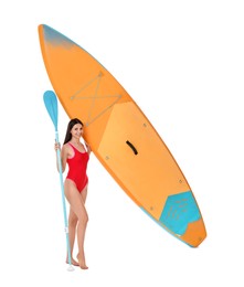 Happy woman with orange SUP board and paddle on white background