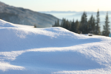Photo of Beautiful snowdrift outdoors, closeup view. Winter weather