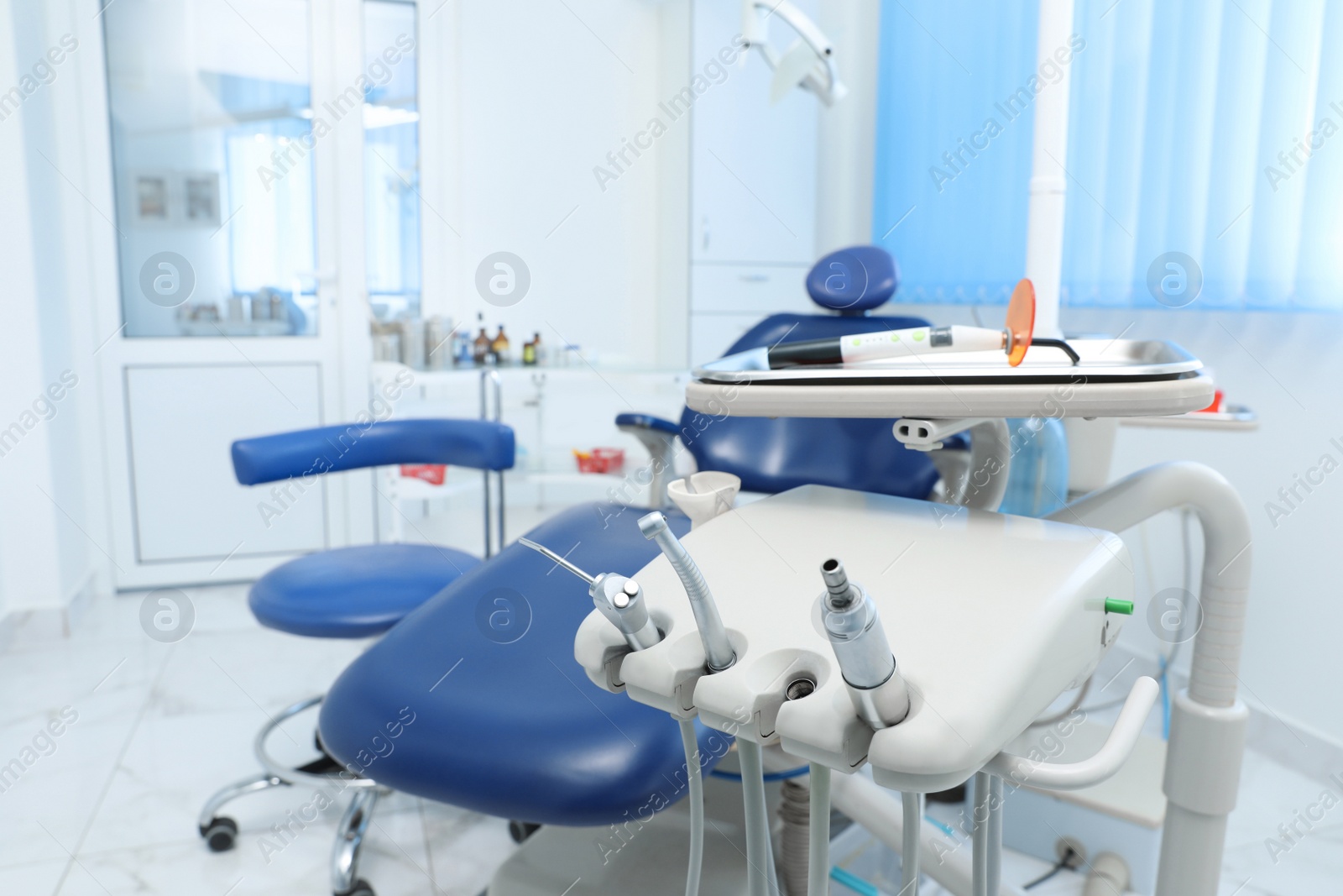 Photo of Set of professional equipment in dentist's office