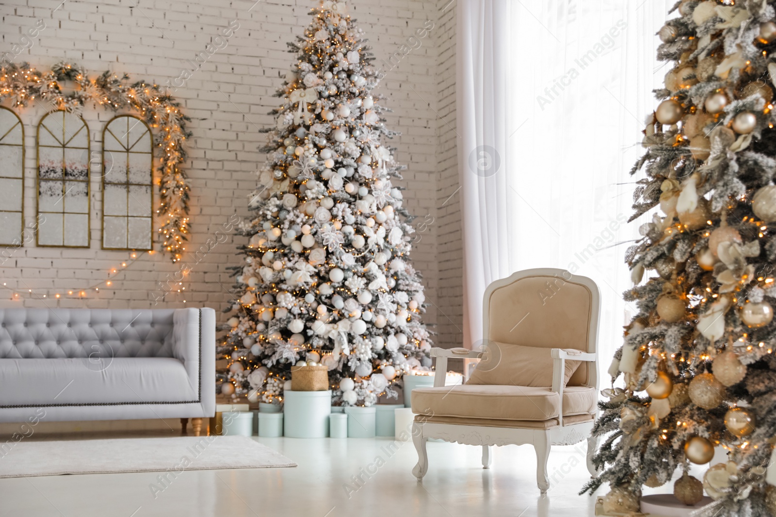 Photo of Beautiful interior of living room with decorated Christmas trees