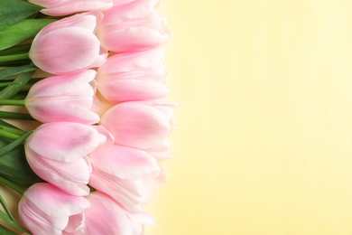 Photo of Beautiful composition with tulips for Mother's Day on color background