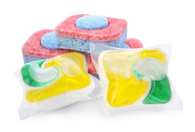 Photo of Dishwasher detergent pods and tablets on white background