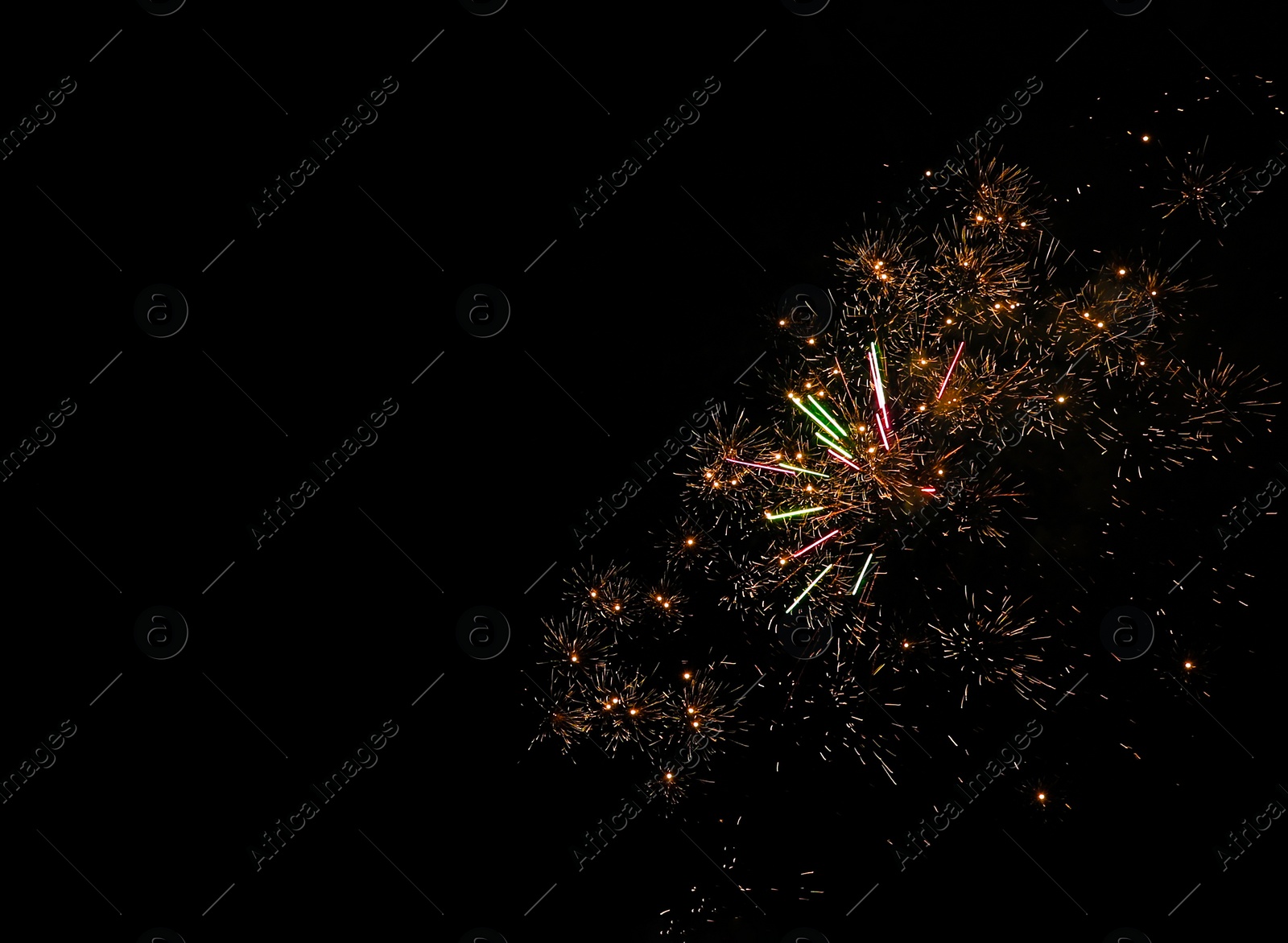 Photo of Beautiful bright fireworks lighting up night sky, space for text